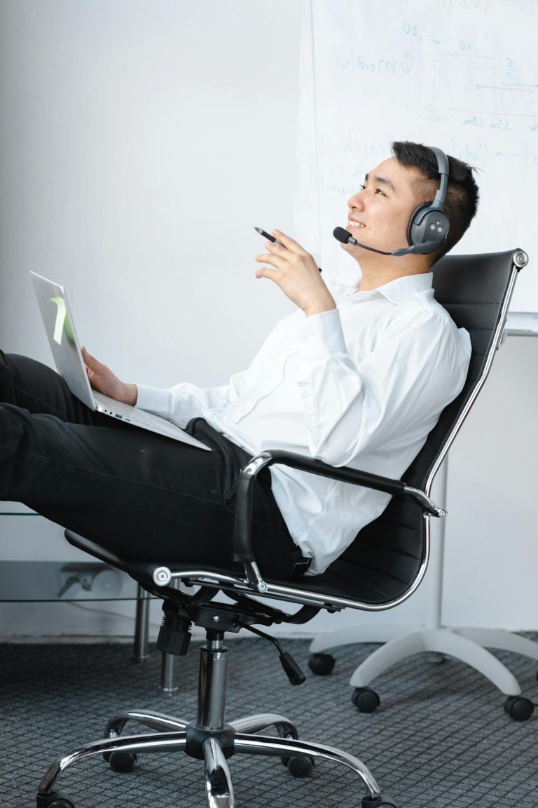 Professional consultant wearing a headset during an online meeting.